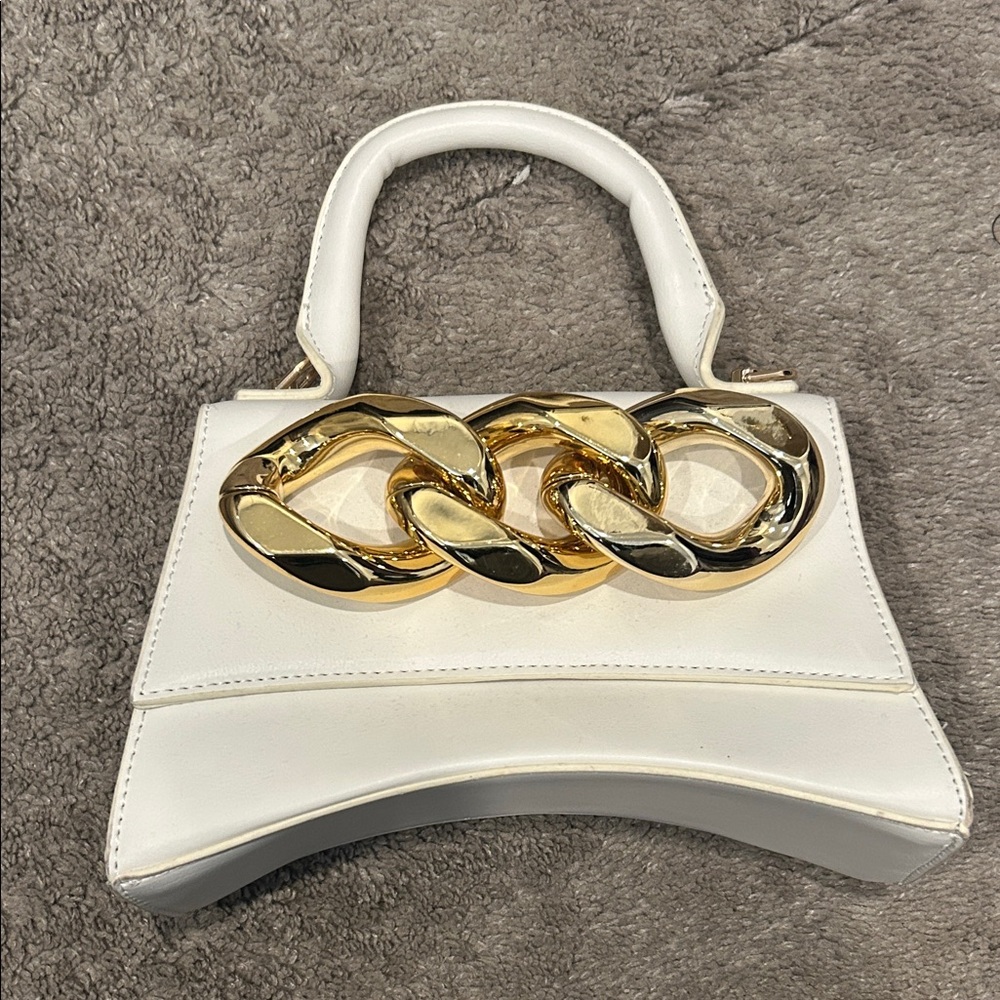Elegant White Handbag with Gold Accents